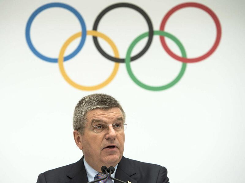 FILE - This is a Monday, July 7, 2014  file photo of International Olympic Committee, IOC, President Thomas Bach of Germany, as speaks during the announcement of the 2022 Olympic Winter Games Candidate Cities (Beijing 2022, Oslo 2022, Almaty 2022) after a