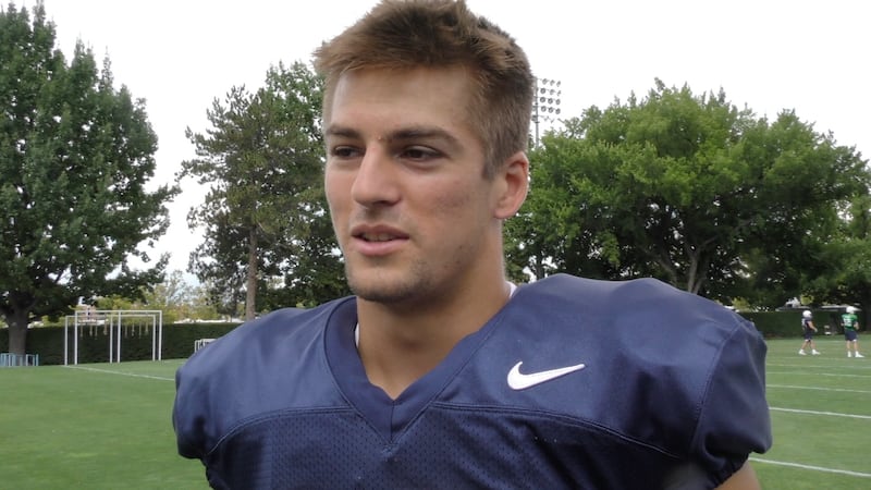 BYU freshman wide receiver Gunner Romney talks with reporters following practice on Wednesday, Aug. 22, 2018 in Provo.