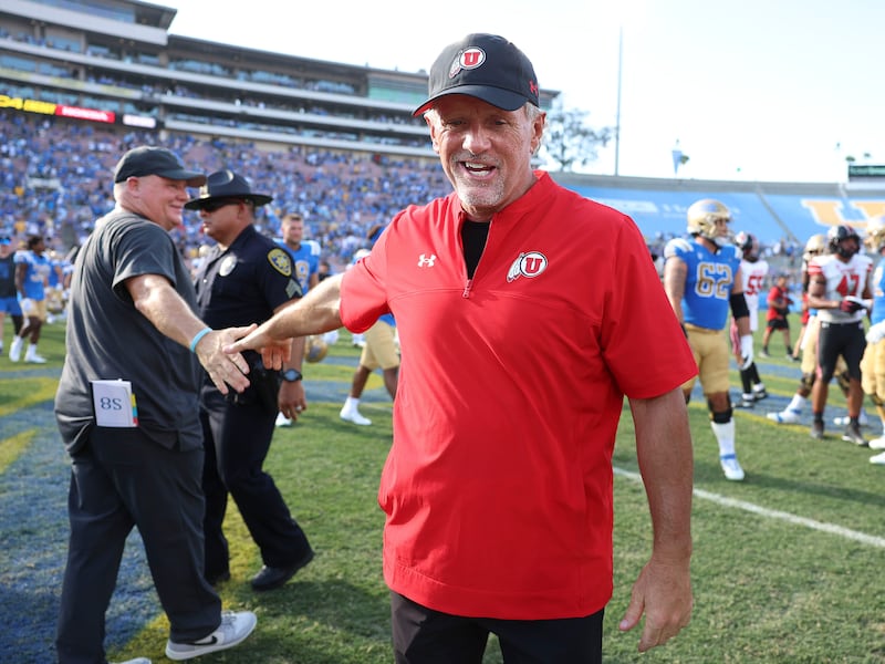 Utah coach Kyle Whittingham walks away after shaking hands with UCLA coach Chip Kelly after loss to the Bruins in Pasadena.