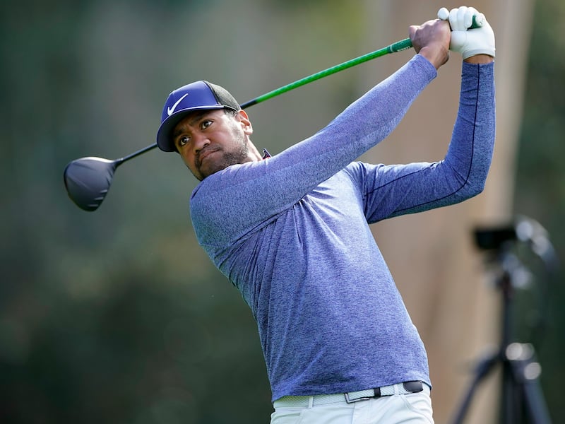 Tony Finau hits his tee shot on the ninth hole as second round play continues during the Genesis Open golf tournament at Riviera Country Club on Saturday, Feb. 16, 2019, in the Pacific Palisades area of Los Angeles. (AP Photo/Ryan Kang)
