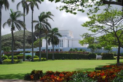 Trees, flowers and vegetation surround the Laie Hawaii Temple.