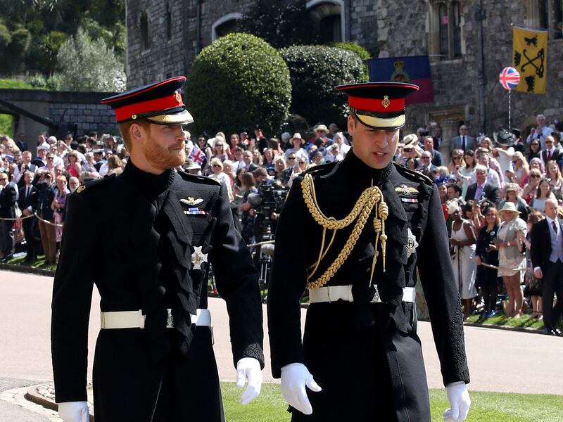 Britain’s Prince Harry, left, and Prince William arrive for the wedding ceremony of Prince Harry and Meghan Markle at St. George’s Chapel in Windsor Castle in Windsor, near London, England, Saturday, May 19, 2018. (Chris Radburn/pool photo via AP)