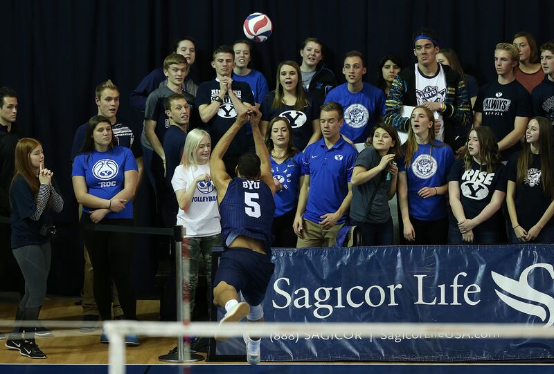 BYU's Fernandez Garcia chases the ball and falls out of bounds as the Cougars and UCSB play at the Smith Field house in Orem on Friday, Feb. 2, 2018. The Guachos won, 3-0.