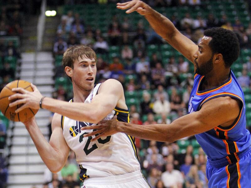 Utah Jazz guard Gordon Hayward (20), left, tries to keep the ball away from Oklahoma\'s No. 11 Lazar Hayward as the Utah Jazz and the Oklahoma City Thunder play Friday, Oct. 12, 2012 in pre-season action at the Energy Solutions arena in Salt Lake City.