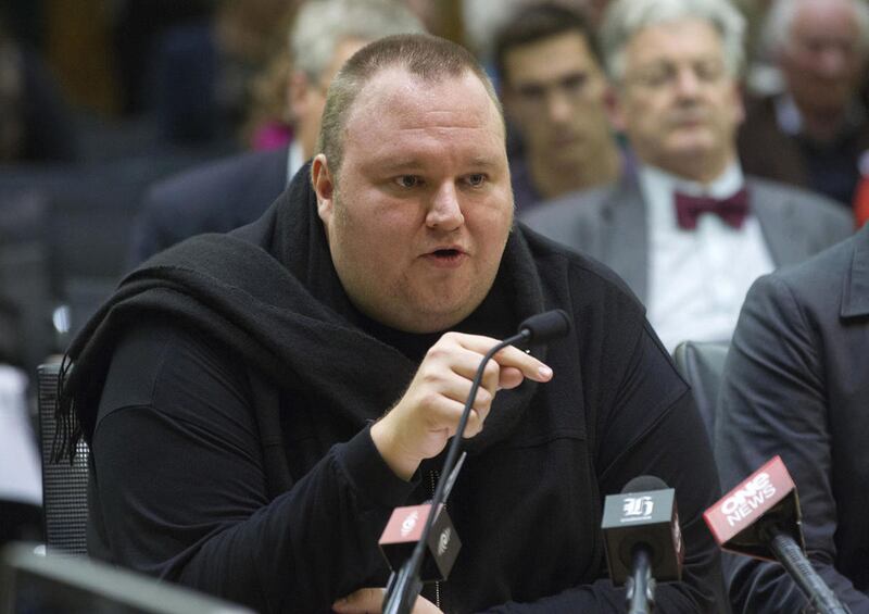 FILE - In this Wednesday, July 3, 2013 file photo, Internet entrepreneur Kim Dotcom speaks during the Intelligence and Security select committee hearing at Parliament in Wellington, New Zealand. A New Zealand judge has ruled that colorful Internet entrepr