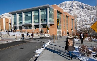 Students walk past BYU's new Engineering Building, part of the Ira A. Fulton College of Engineering, on the school's campus in Provo on Tuesday, Dec. 4, 2018.