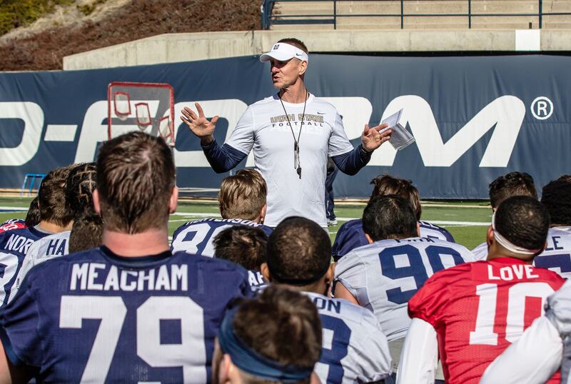 Utah State head football coach Gary Andersen talks to his team at the end of scrimmage Saturday, March 30, 2019, at Maverik Stadium in Logan. 