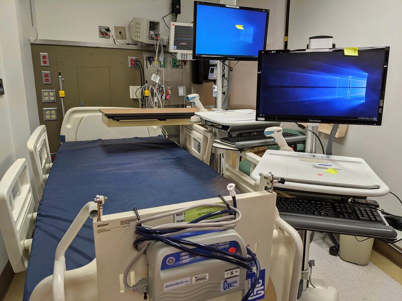In this Thursday, April 9, 2020, photo, a patient care room is reconditioned for use during the coronavirus pandemic at the St. Vincent Medical Center building in Los Angeles. The empty hospital near downtown Los Angeles is being leased by the State of California to operate as a healthcare facility during the COVID-19 outbreak in Los Angeles County.