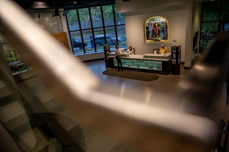Front desk staff await visitors at the Church History Museum. The museum reopened this week after an extended closure for COVID-19.