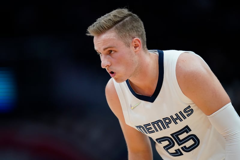 Memphis Grizzlies guard Sam Merrill stands on the court in the second half of an NBA basketball game against the Washington Wizards, Friday, Nov. 5, 2021, in Washington. (AP Photo/Patrick Semansky)