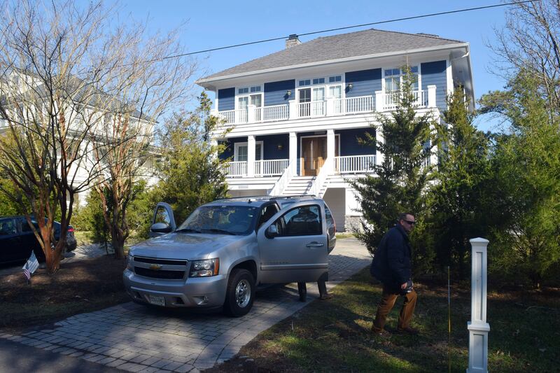 U.S. Secret Service agents are seen in front of Joe Biden’s Rehoboth Beach, Del., home on Jan. 12, 2021.