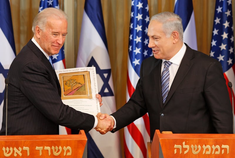 Then-U.S Vice President Joe Biden shakes hand with Israel’s Prime Minister Benjamin Netanyahu at the Prime Ministers residence in Jerusalem on March 9, 2010.