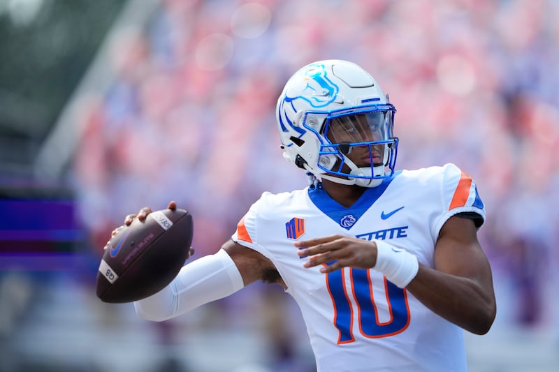 Boise State quarterback Taylen Green warms up before a game against Washington on Sept. 2, 2023, in Seattle.