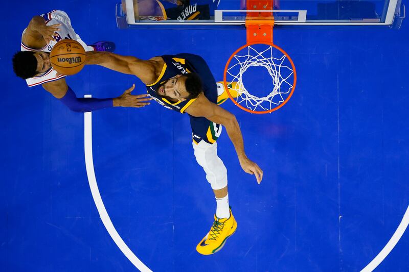 Utah Jazz’s Rudy Gobert jumps to block a shot by Philadelphia 76ers’ Tobias Harris