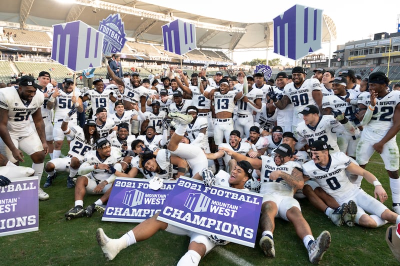 Utah State celebrates after defeating San Diego State for the Mountain West Conference Championship