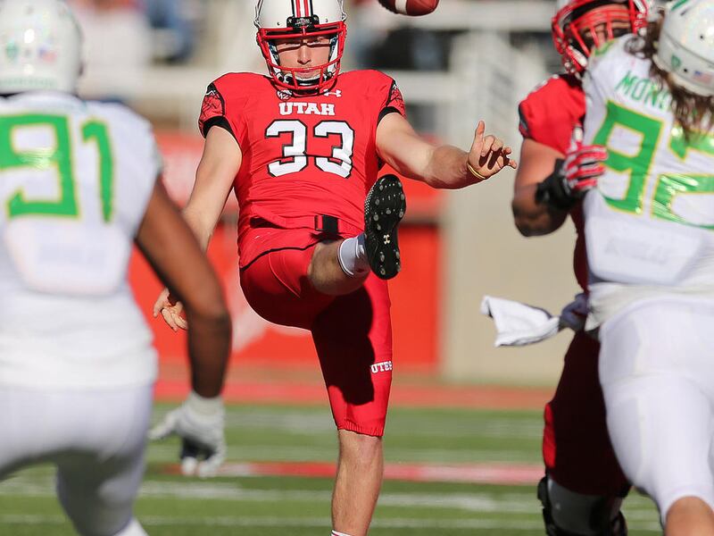 Utah Utes punter Mitch Wishnowsky (33) kicks against the Oregon Ducks in Salt Lake City on Saturday, Nov. 19, 2016. Oregon won 30-28.