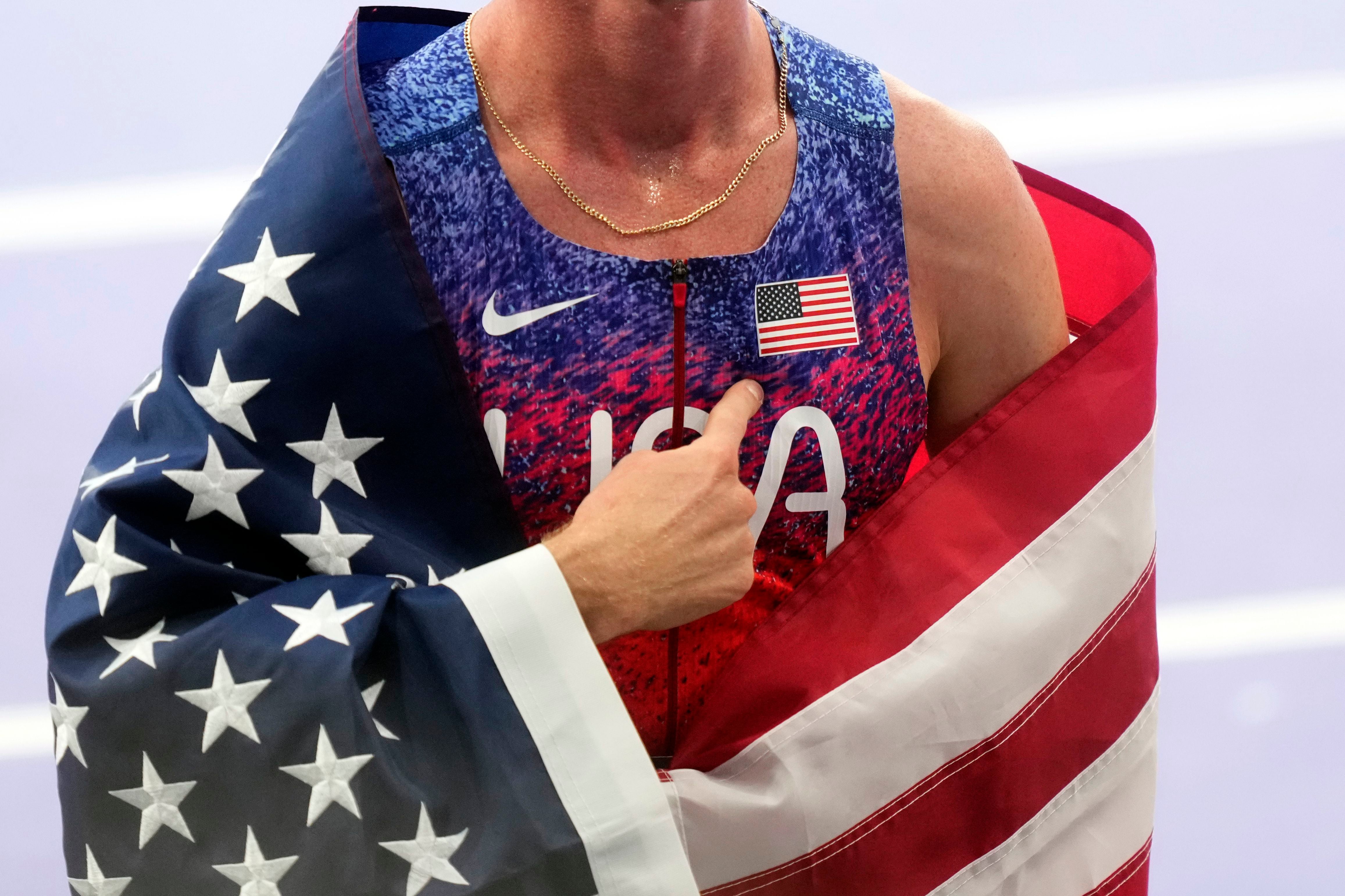 Why do Olympic medal winners wear their country's flags? – Deseret News